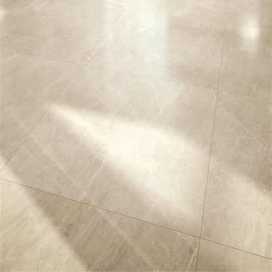 Porcelain floor in beige marble effect with matte finish installed in a bright interior space, Athena almond