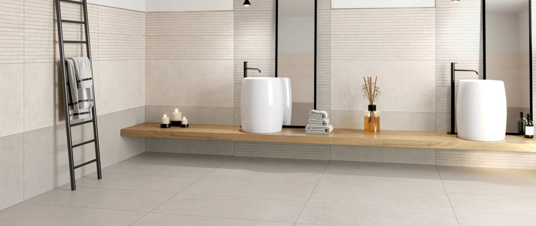 Beige and taupe 60x120 porcelain tiles laid horizontally on a bathroom wall