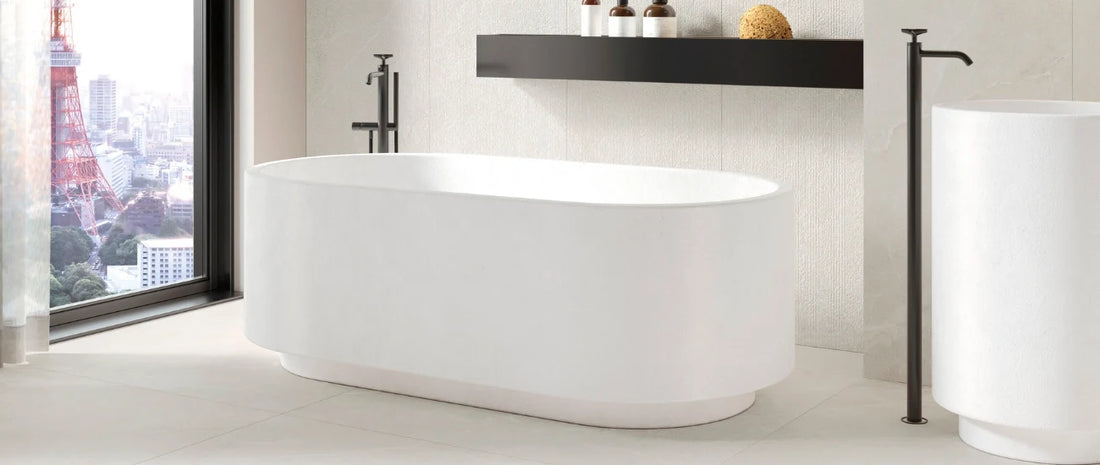 Modern bathroom with stone-effect porcelain tiles, freestanding bathtub and elegant wall coverings