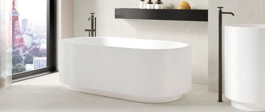Modern bathroom with stone-effect porcelain tiles, freestanding bathtub and elegant wall coverings