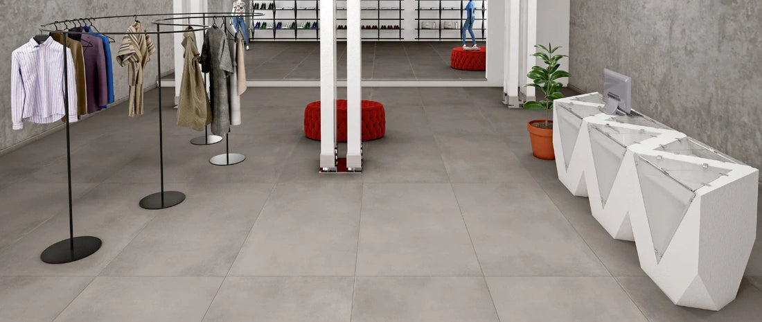 Retail store interior with concrete-effect porcelain tiles and modern minimalist décor