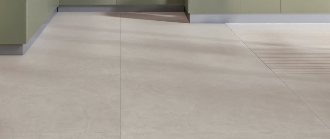 Taupe concrete-effect porcelain tiles in 120x120 large format on a kitchen floor