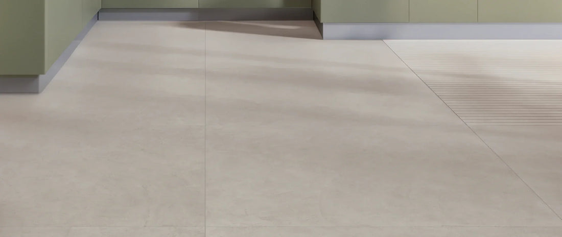 Taupe concrete-effect porcelain tiles in 120x120 large format on a kitchen floor