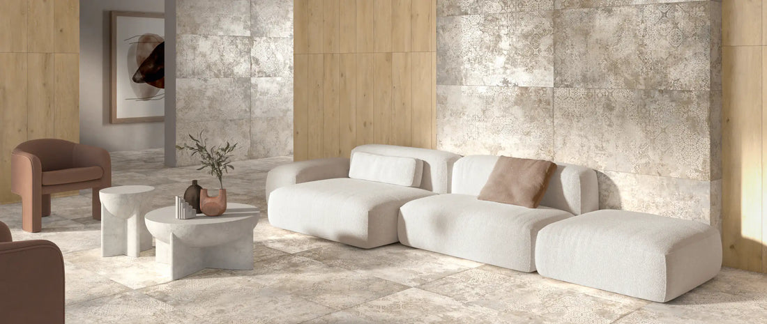 Living room with decorative porcelain tiles in warm greige tones, paired with wood-effect tiles