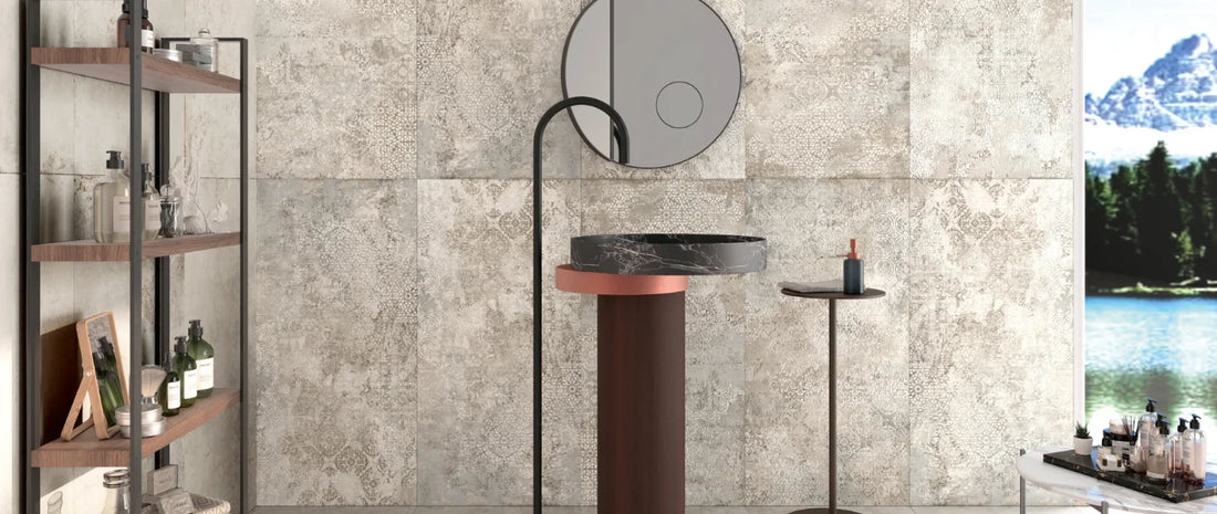 Decorative porcelain tiles with subtle tone-on-tone patterns on a modern bathroom wall