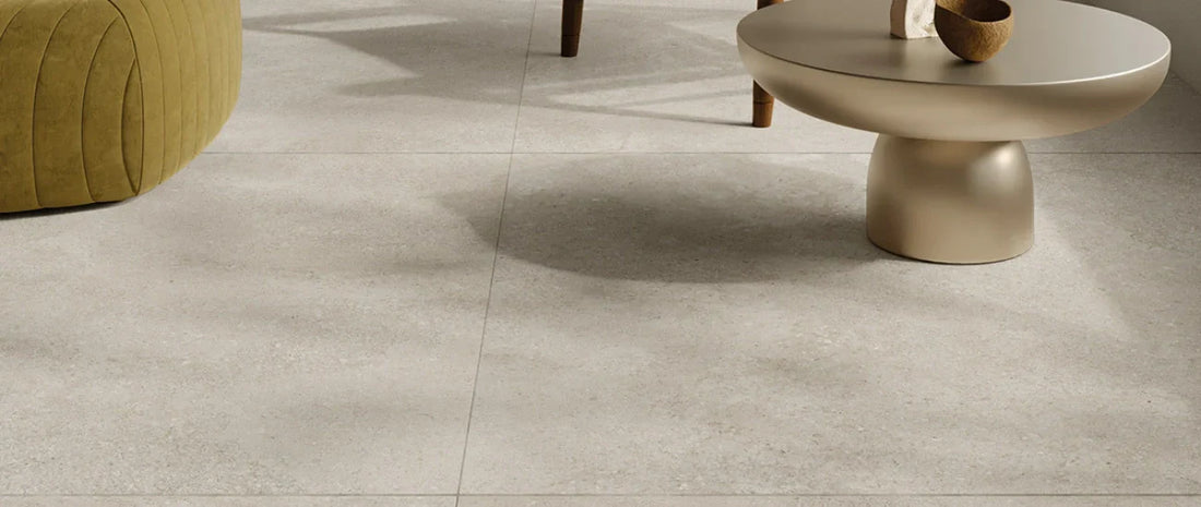 Large format porcelain tiles with stone effect in a modern living room interior