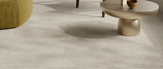 Large format porcelain tiles with stone effect in a modern living room interior