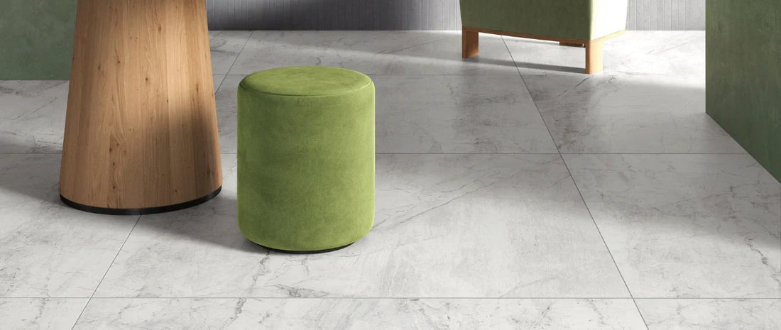 Matte marble effect porcelain tiles in a modern interior with large-format flooring