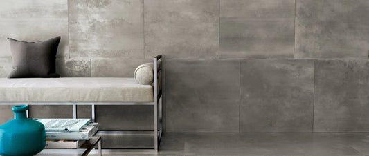 Metal effect porcelain tiles used on walls and floor in a modern industrial interior
