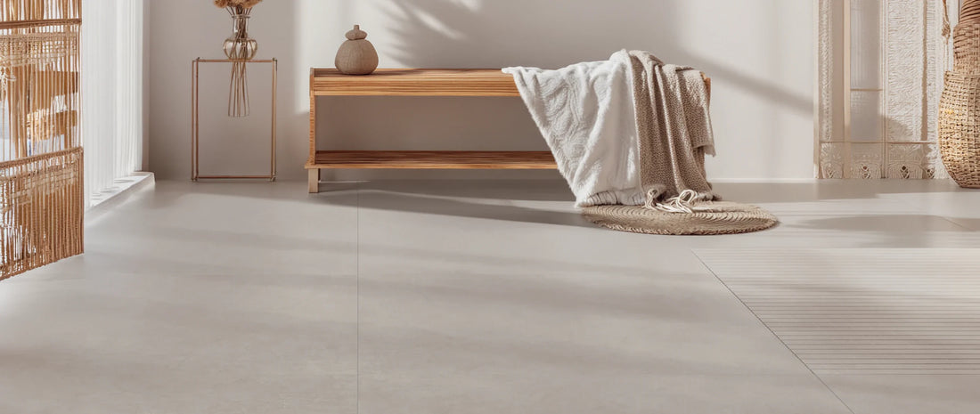 Minimalist living space with taupe concrete effect porcelain tiles in 120x120 format