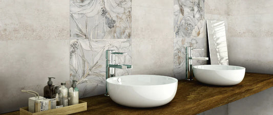 Modern bathroom with porcelain tiles in neutral tones, featuring beige wall tiles, decorative floral accents and contemporary washbasins