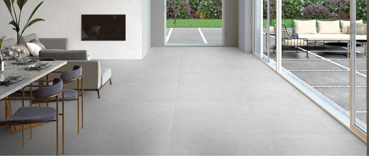 Modern living room with large-format porcelain tiles in light grey