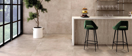 Porcelain tiles with concrete effect in a modern high-traffic living area with large-format flooring