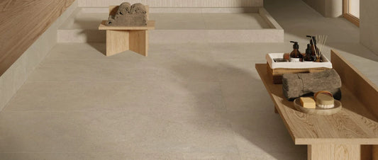 beige stone effect porcelain tiles with minimal grout lines in modern minimalist bathroom