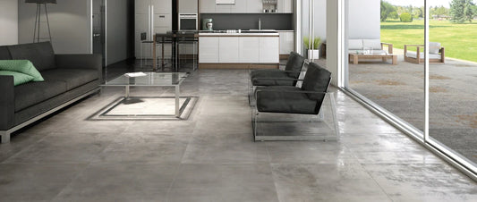 Rectified porcelain tiles with metal effect in a modern open-plan living room