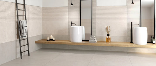 Small bathroom with light porcelain stoneware tiles in concrete effect, designed to enhance brightness and make the space look visually larger