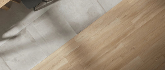 Combination of wood-effect and concrete-effect porcelain tiles in a modern interior design setting