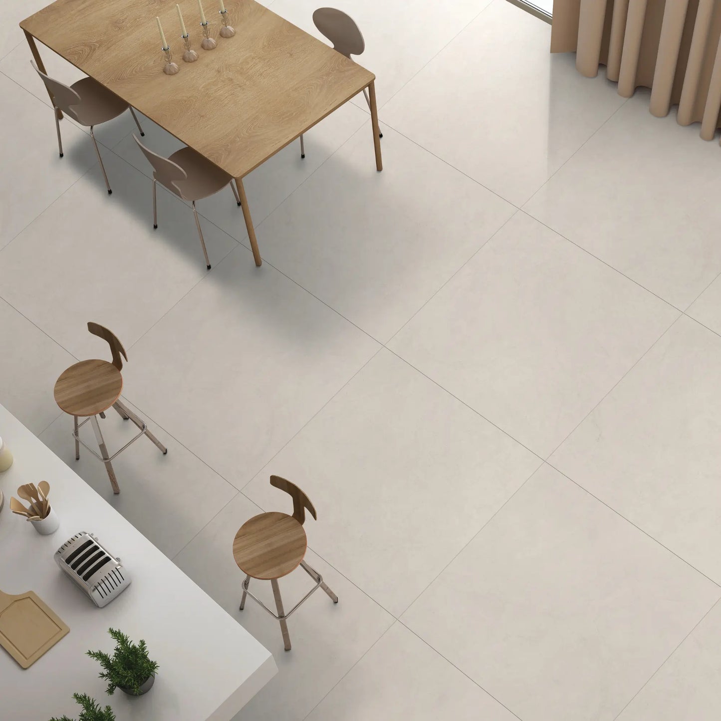Modern kitchen and dining area with beige concrete-effect porcelain flooring. le resine beige