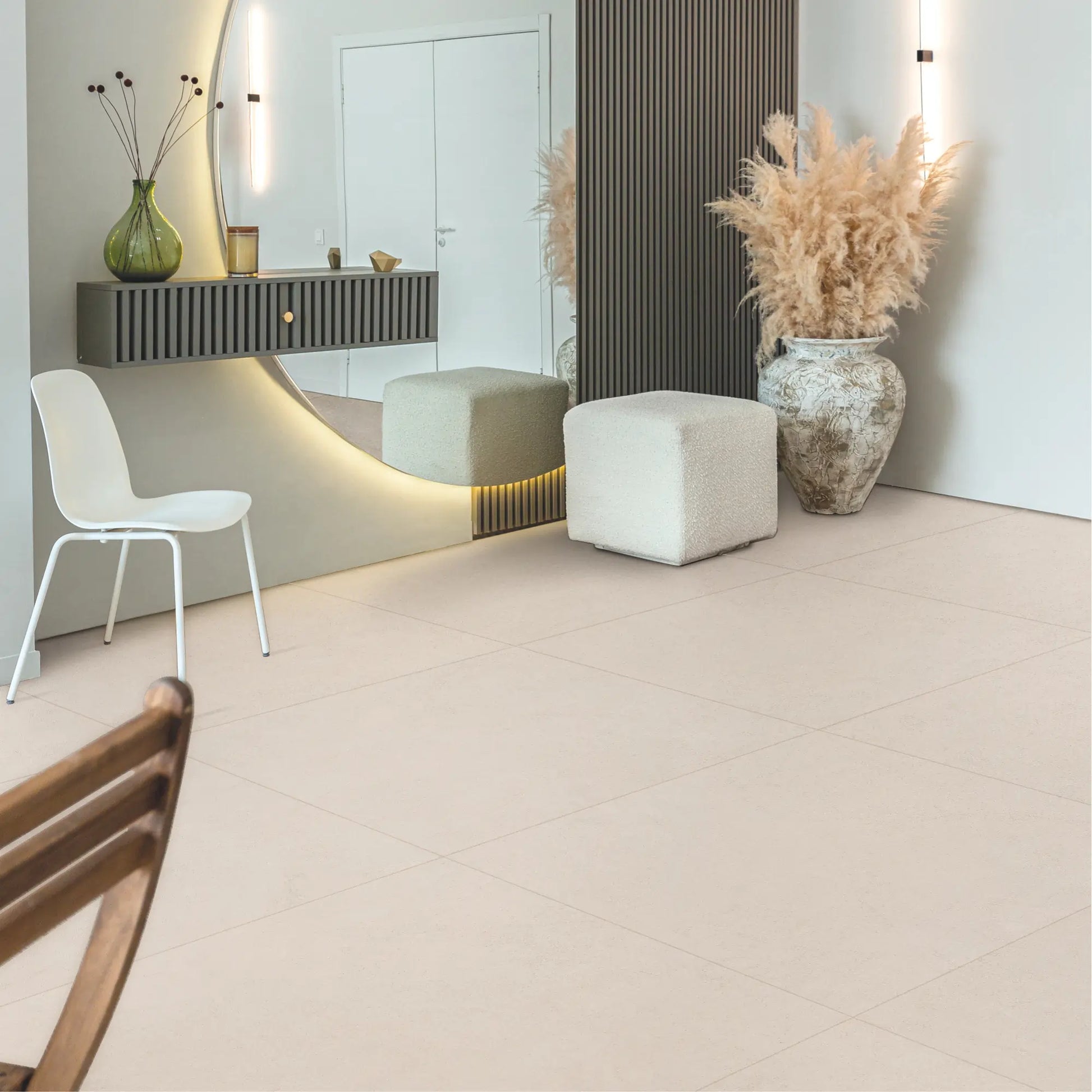 Living room interior with beige concrete-effect porcelain floor tiles. le resine beige