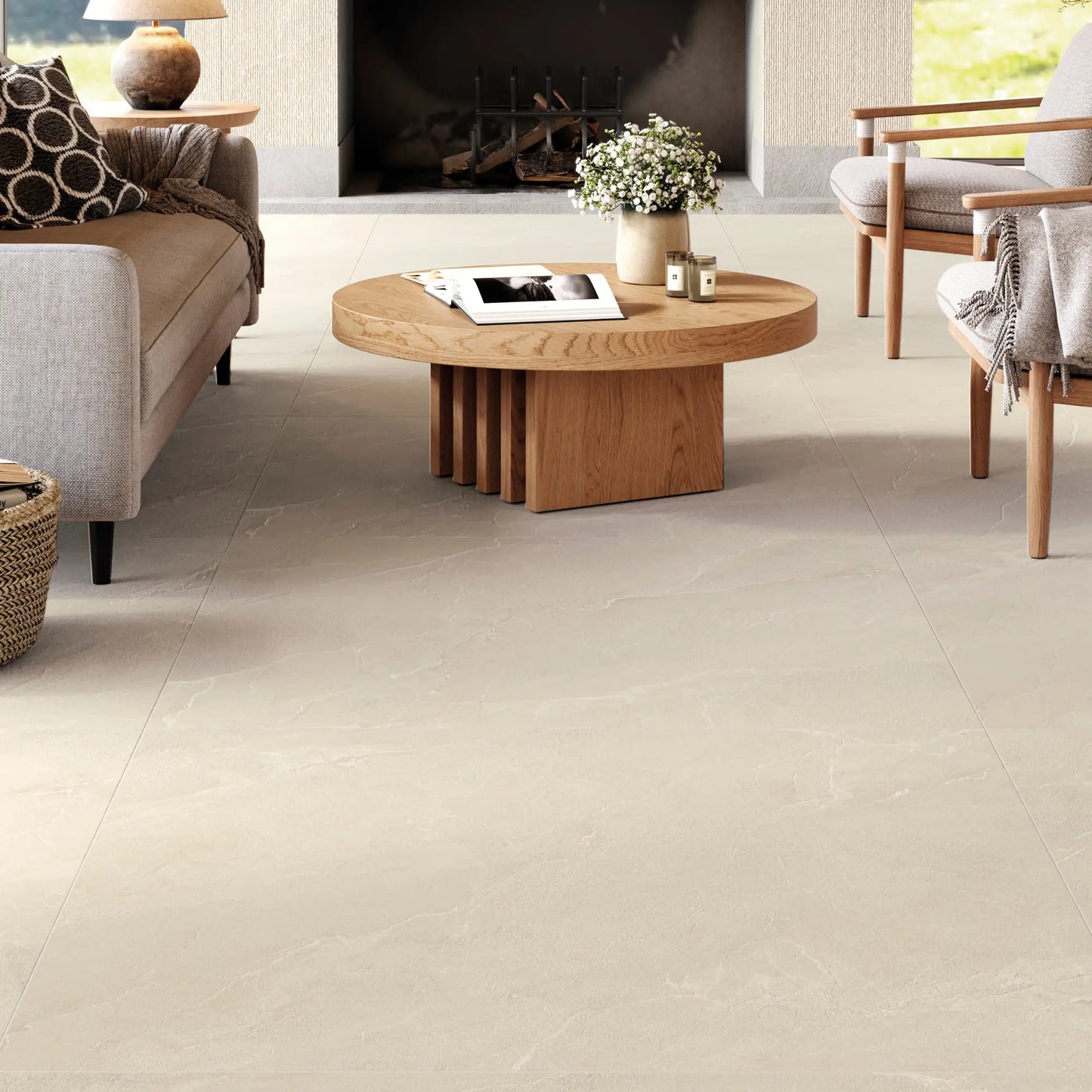 Living room with beige stone effect porcelain tile flooring, Cortina Stone Sabbia