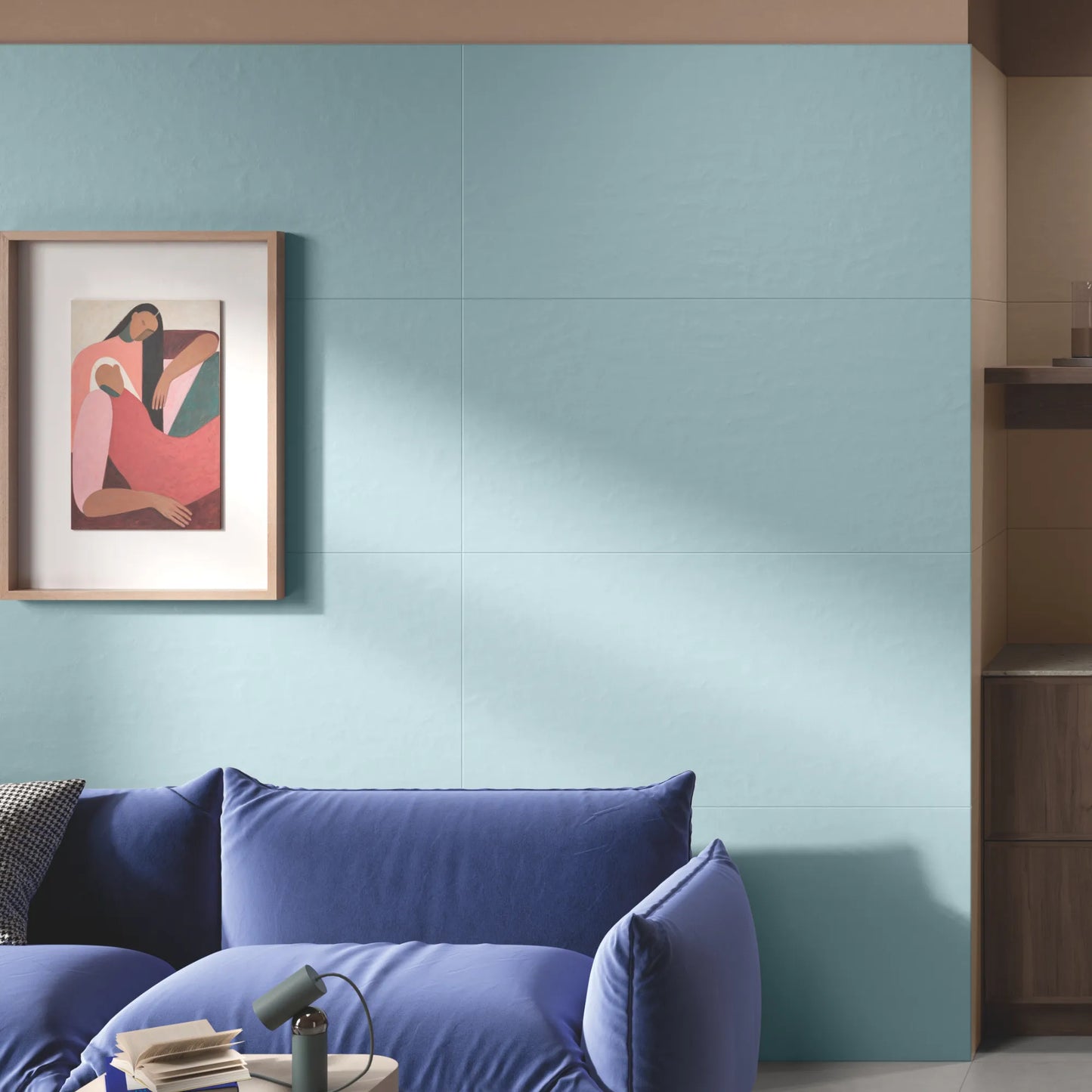 Close up of blue concrete effect porcelain wall tiles in modern living room interior, Le Resine Azzurro