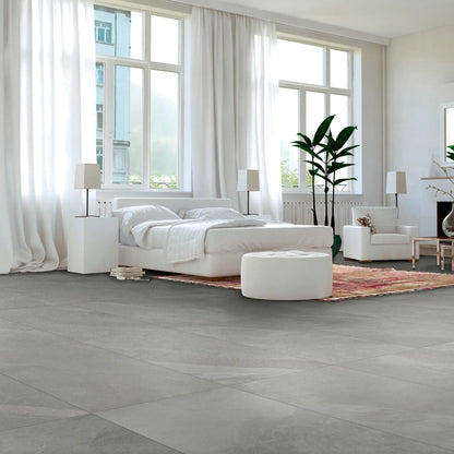 Bedroom interior with grey stone effect porcelain floor tiles – Slash Mid Grey