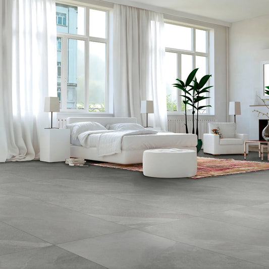 Bedroom interior with grey stone effect porcelain floor tiles – Slash Mid Grey