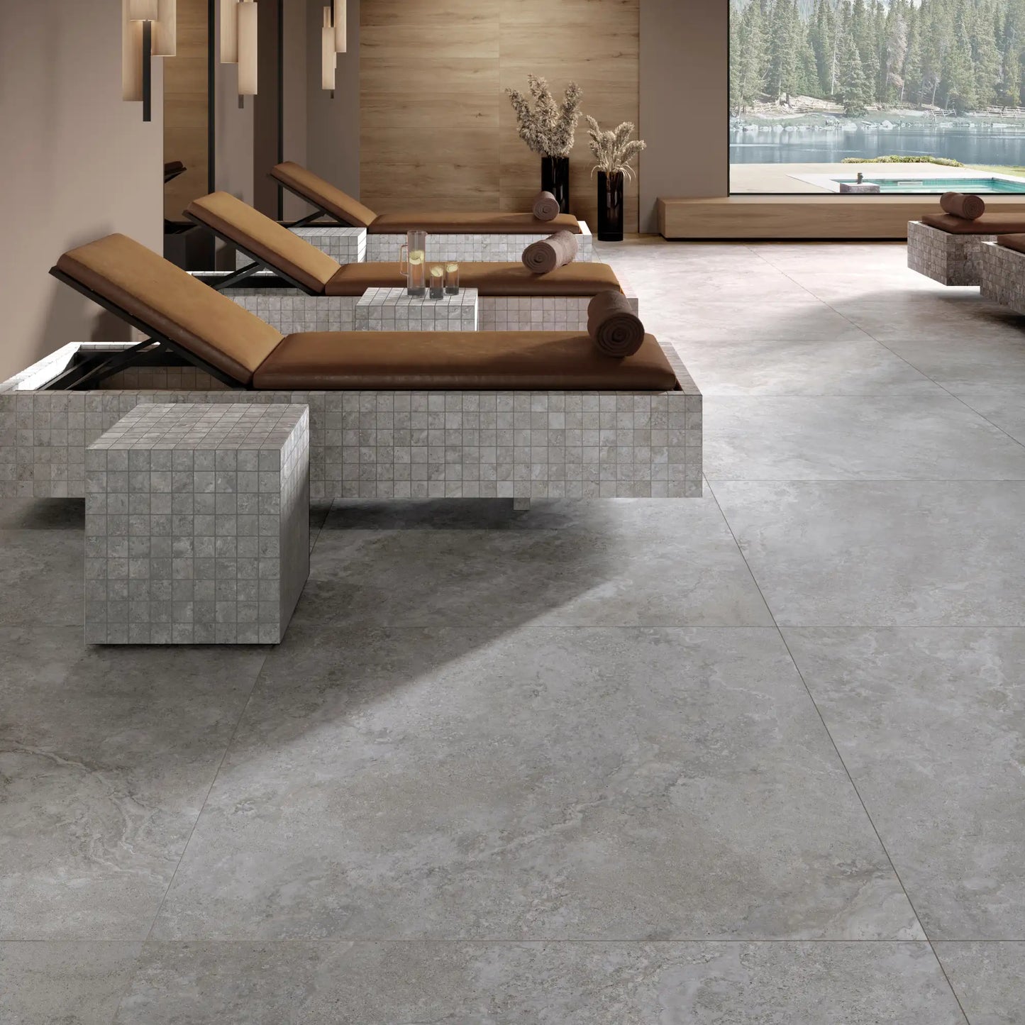 Grey stone effect porcelain tile flooring in a spa interior with natural stone-inspired veining, Dolomia Stone Grey