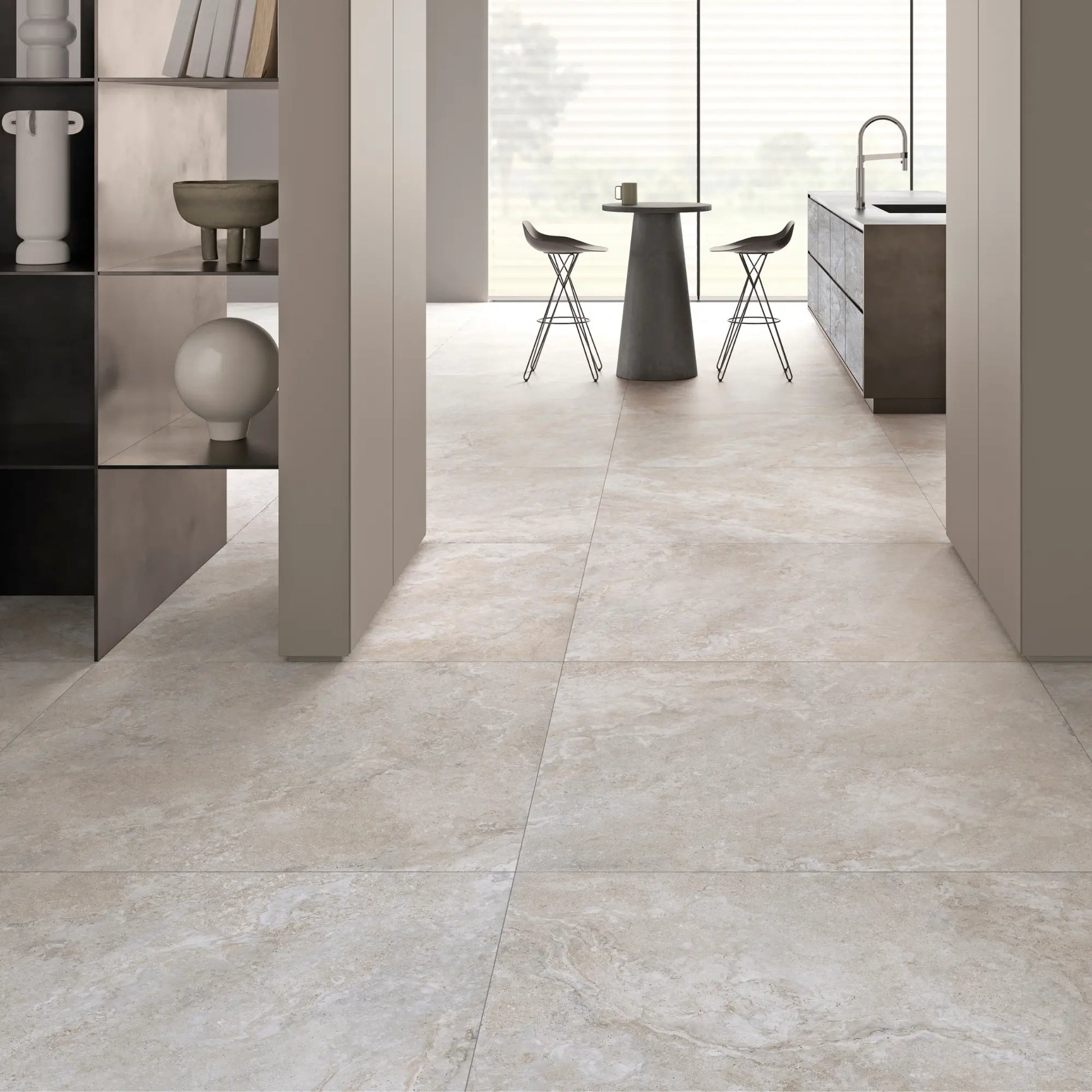 Light stone effect porcelain flooring in a modern living and kitchen space, dolomia stone white