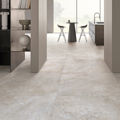 Light stone effect porcelain flooring in a modern living and kitchen space, dolomia stone white