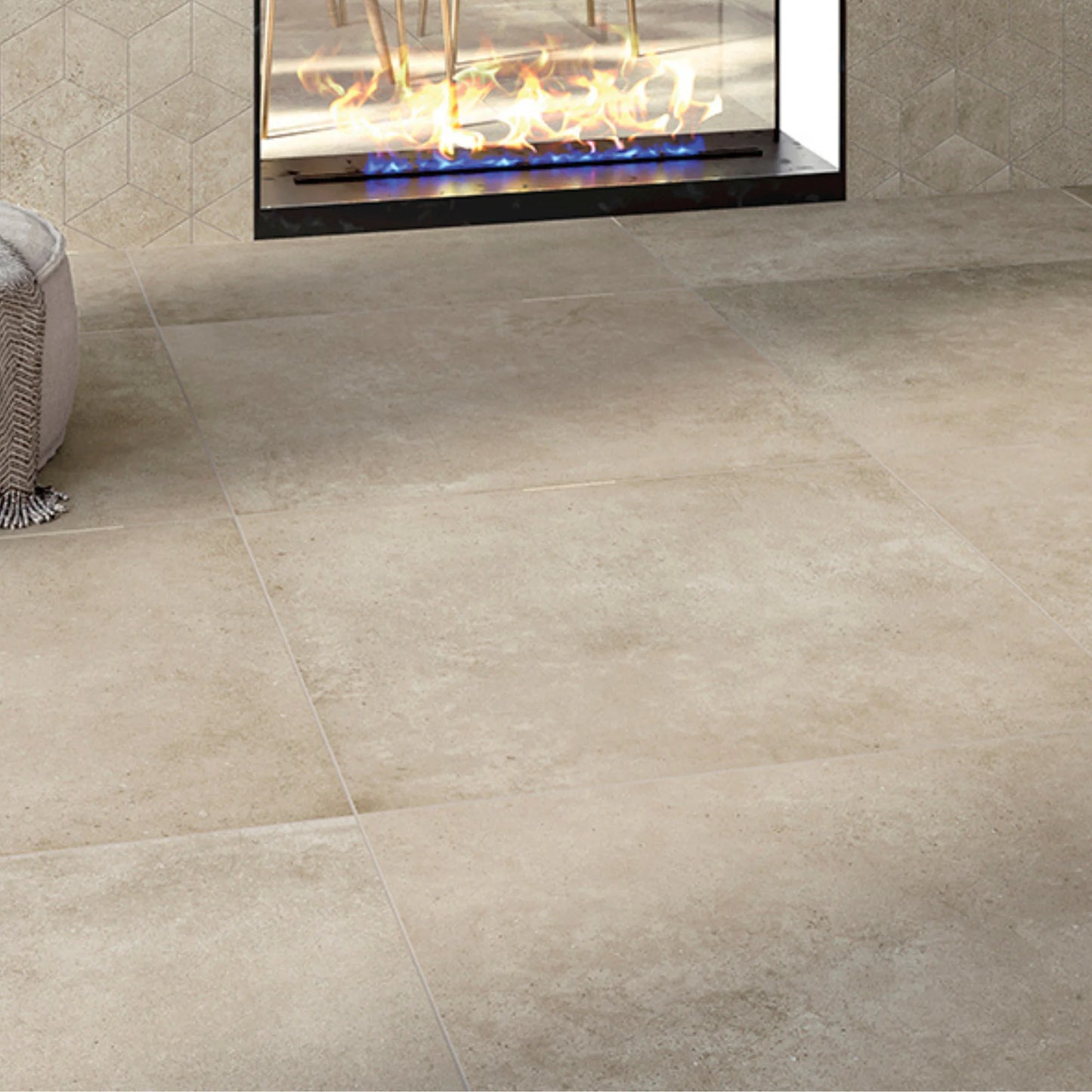 Beige concrete-effect porcelain stoneware floor tiles in a modern living room.