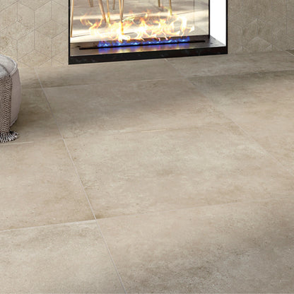 Beige concrete-effect porcelain stoneware floor tiles in a modern living room.