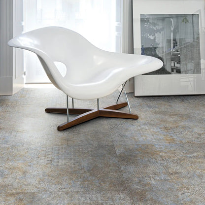 Porcelain stoneware decorative floor tile in a modern living room.