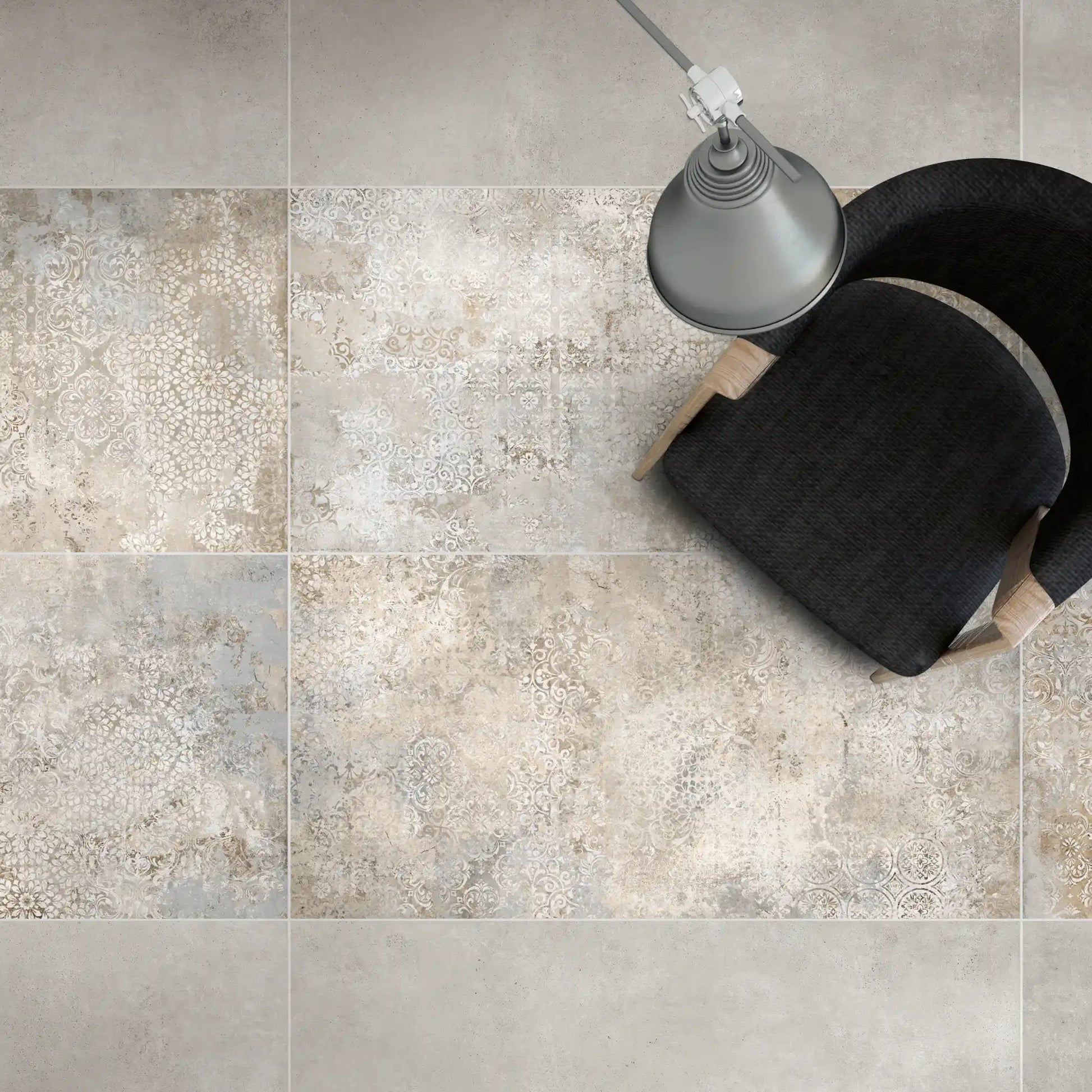 Top view of porcelain stoneware decorative floor tile with subtle beige and grey pattern.