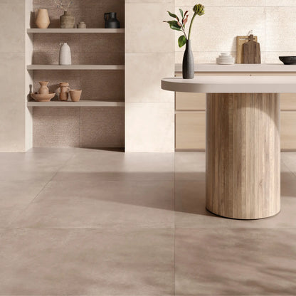 Modern interior with taupe concrete-effect porcelain stoneware flooring and natural light. Continental Taupe.