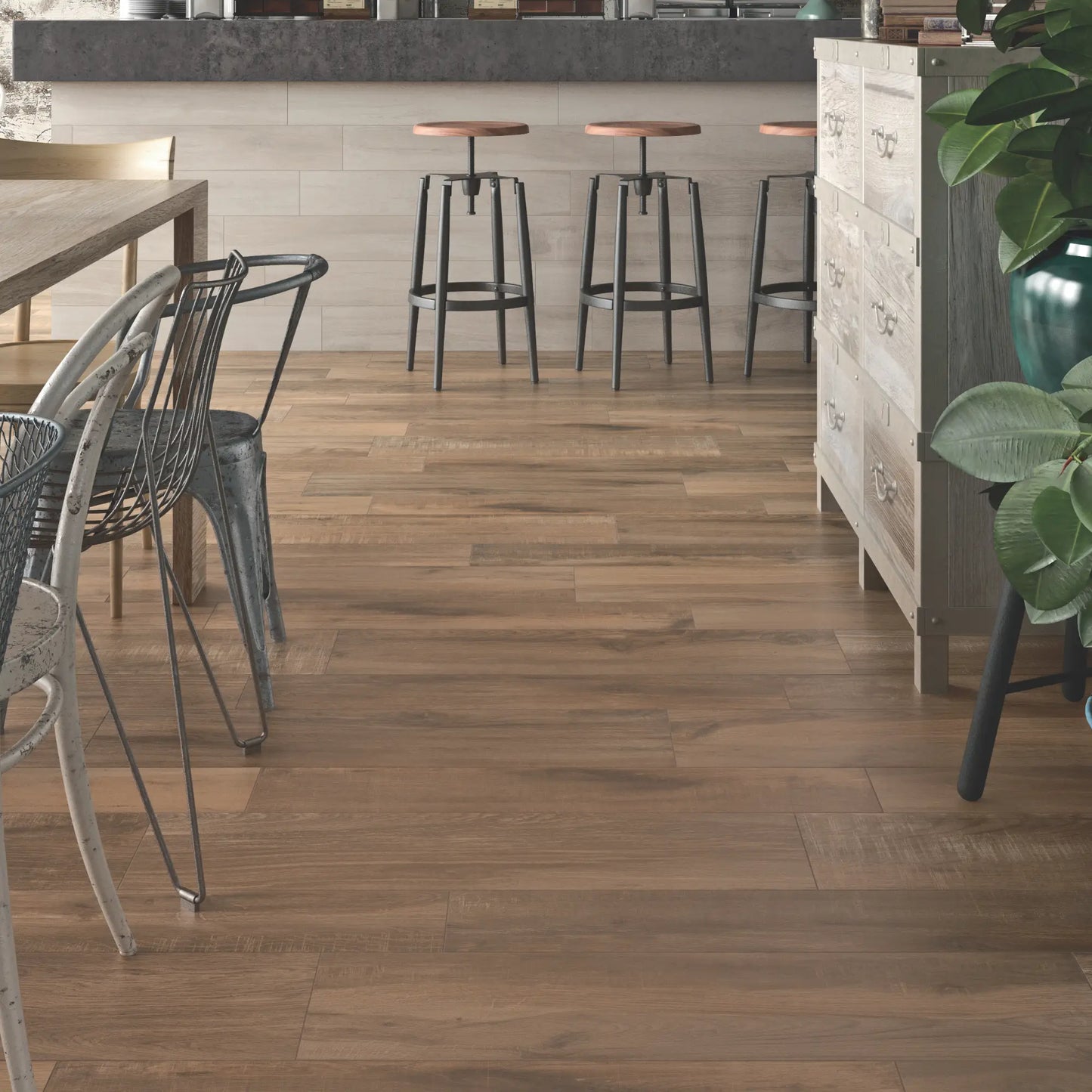 Brown oak wood-effect porcelain flooring in a modern kitchen and bar area – North Wind Brown