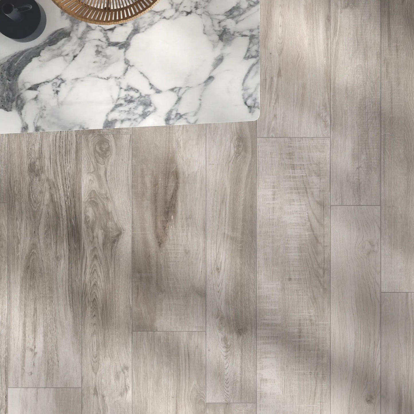 Top view of grey oak wood-effect porcelain flooring with natural grain and soft tonal variation – North Wind Grey