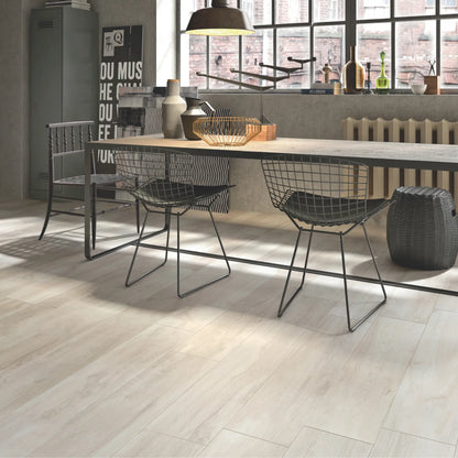 Ivory oak wood-effect porcelain flooring in a modern kitchen and dining area – North Wind Ivory