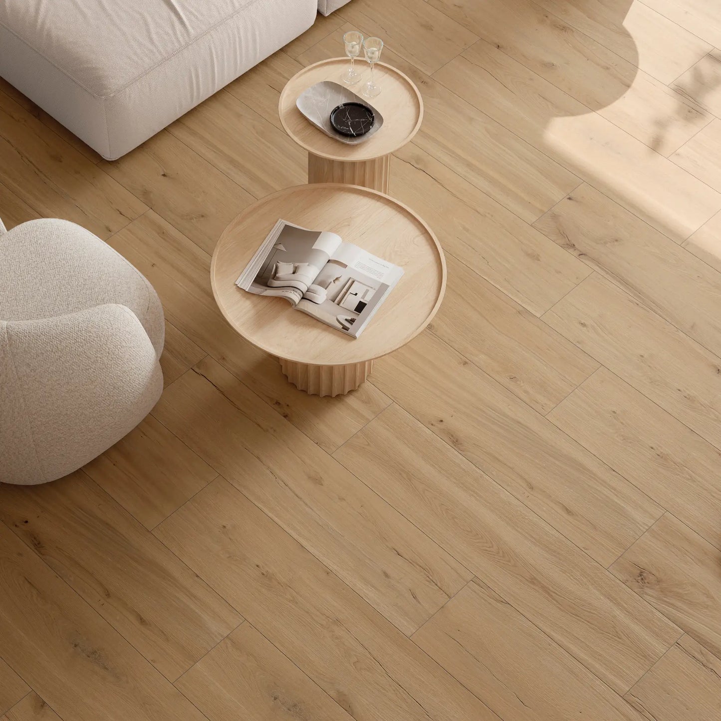 Light ash wood-effect porcelain tile flooring in a modern living room – Natura Frassino