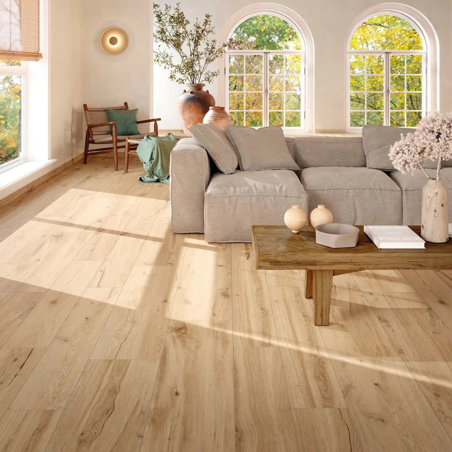 Light oak wood-effect porcelain flooring in a bright modern living room – Natura Betulla
