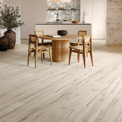 Light wood-effect porcelain flooring in a modern dining room – Natura Magnolia