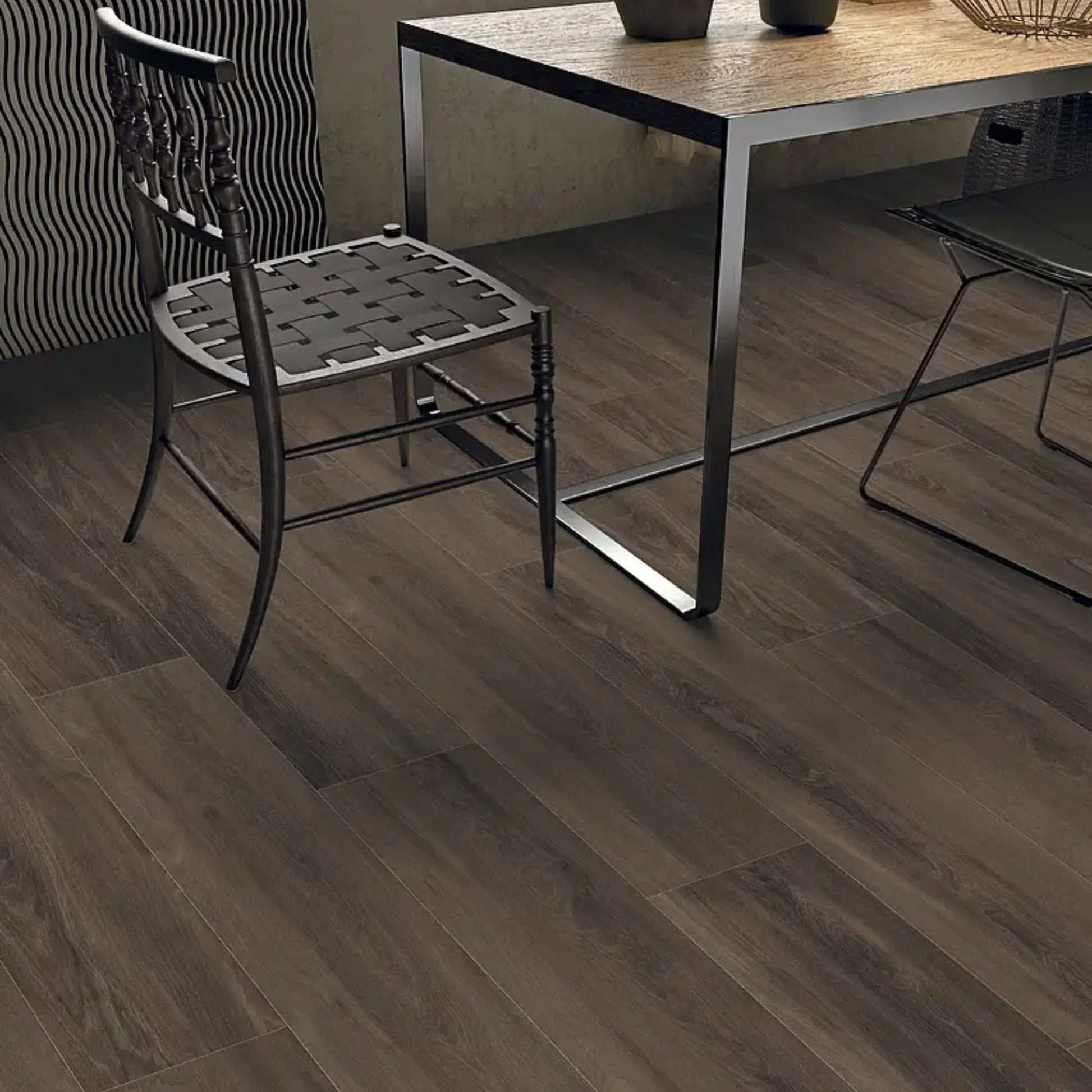 Dark brown wood-effect porcelain tile flooring in a modern dining space - Skyline Dark Brown
