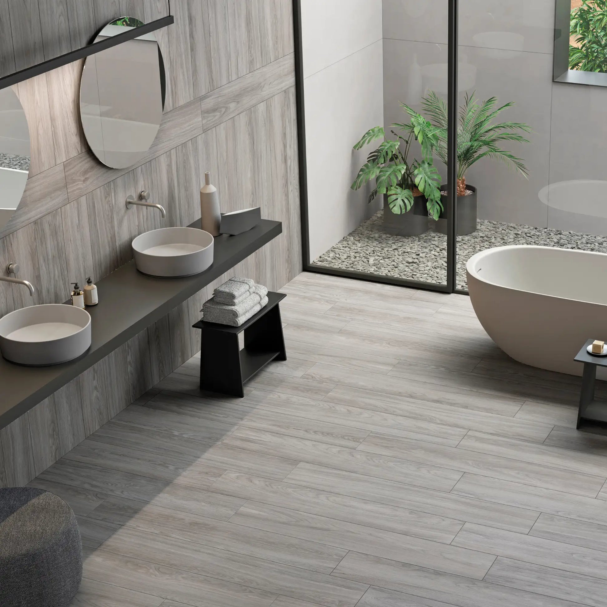 Modern bathroom with light grey wood-effect porcelain tile flooring and soft natural lighting - Skyline Grey