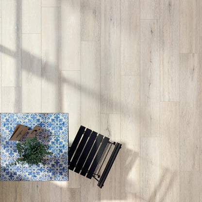 Top view of light oak wood-effect porcelain tiles with subtle grain and soft neutral shading - Firenze Sbiancato