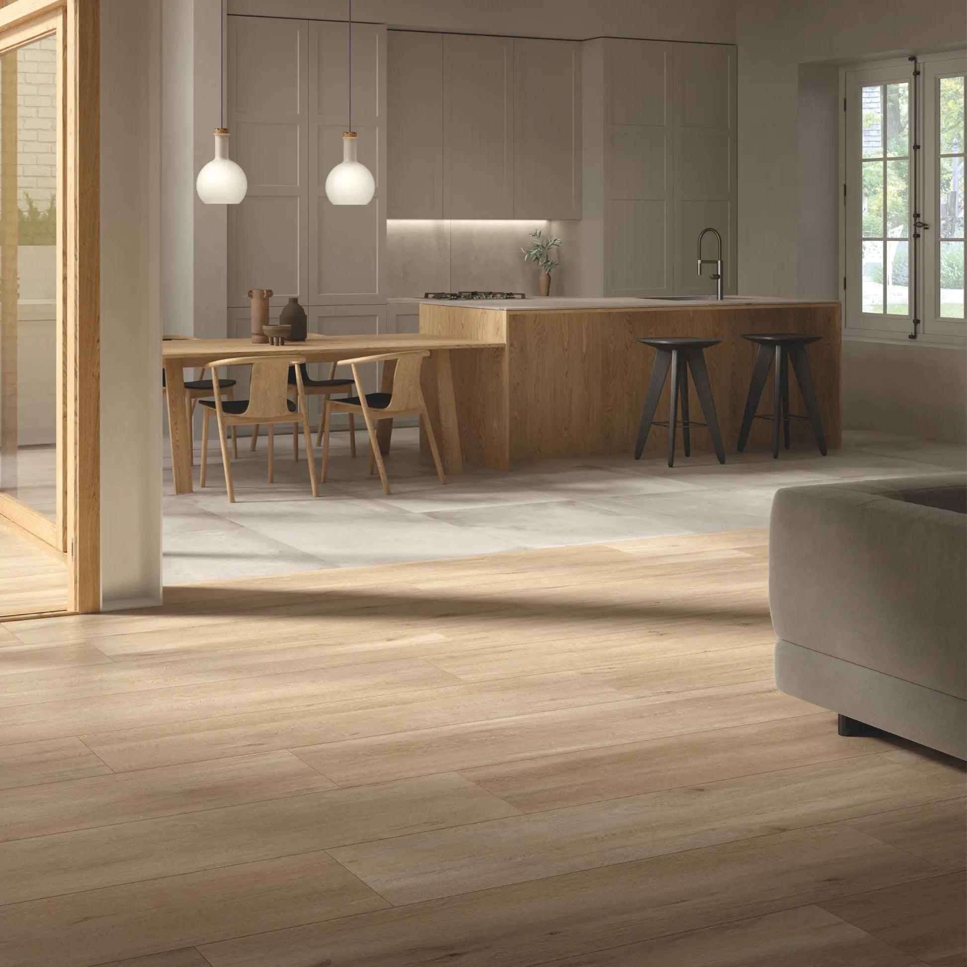 Oak wood-effect porcelain flooring in an open-space kitchen and dining area with soft natural tones - Firenze Rovere